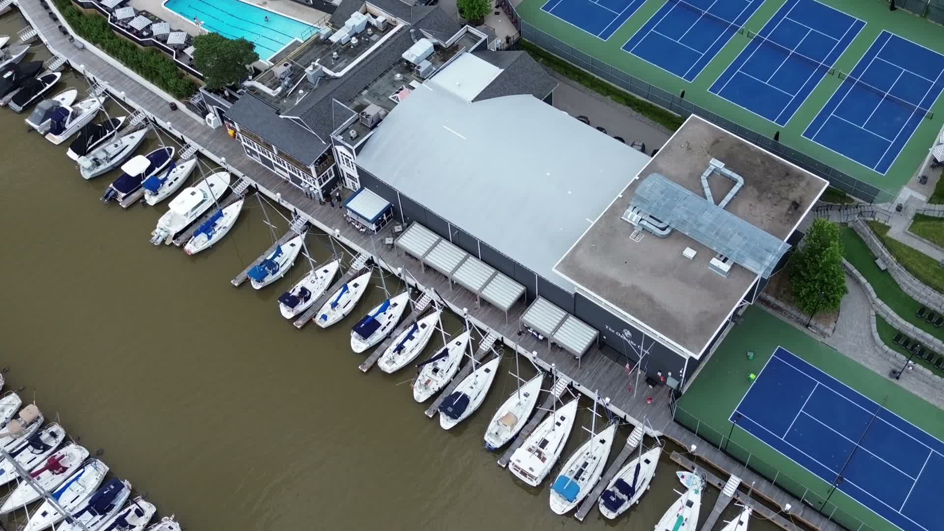 Aerial view of The Oakville Club, marina and racquet courts